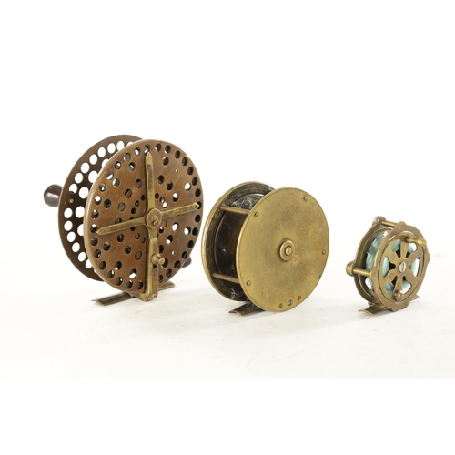 586 - THREE VINTAGE BRASS FISHING REELS, a 5