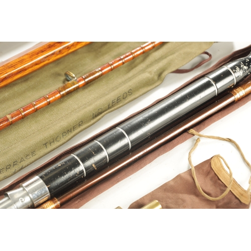 593 - A COLLECTION OF VINTAGE FISHING ITEMS, comprising of a bamboo trout rod, a 19th-century boat rod, a ... 