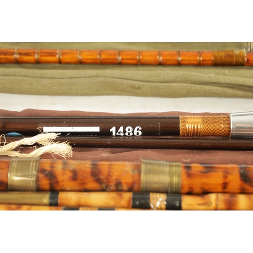 593 - A COLLECTION OF VINTAGE FISHING ITEMS, comprising of a bamboo trout rod, a 19th-century boat rod, a ... 