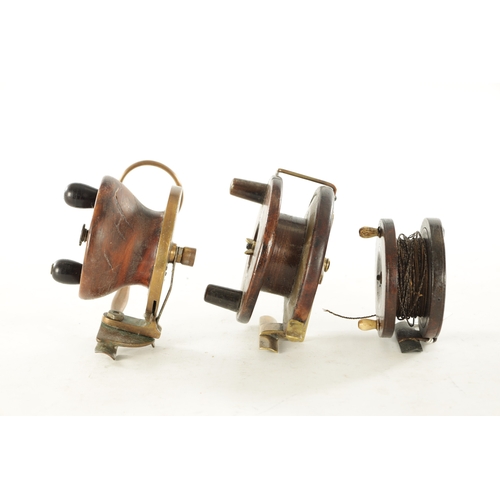 596 - A COLLECTION OF THREE 19TH CENTURY WOOD AND BRASS FISHING REELS, one by Alvey with a 4