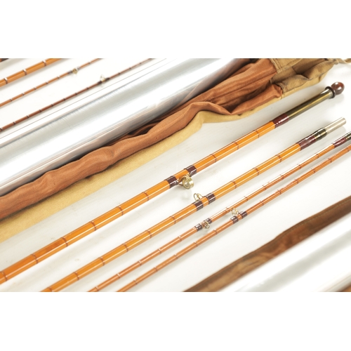 600 - A COLLECTION OF THREE VINTAGE HARDY FISHING RODS, a 