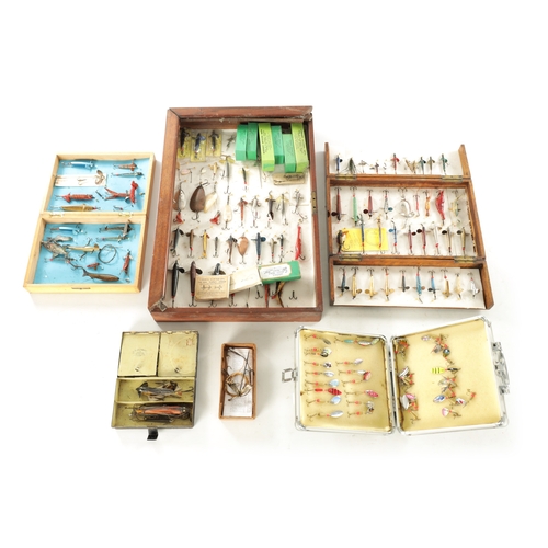 607 - A COLLECTION OF VINTAGE FISHING LURES AND MODERN SPINNERS in various cases and boxes.