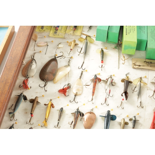 607 - A COLLECTION OF VINTAGE FISHING LURES AND MODERN SPINNERS in various cases and boxes.