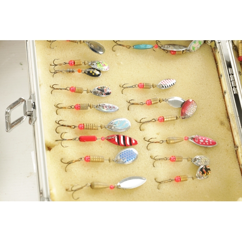 607 - A COLLECTION OF VINTAGE FISHING LURES AND MODERN SPINNERS in various cases and boxes.