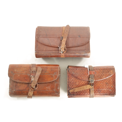 608 - THREE LEATHER FLY WALLETS containing various flies and lines. (3)