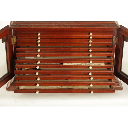 609 - A LATE 19TH CENTURY TABLE CABINET CONTAINING VARIOUS FISHING SALMON FLIES the mahogany cabinet with ... 