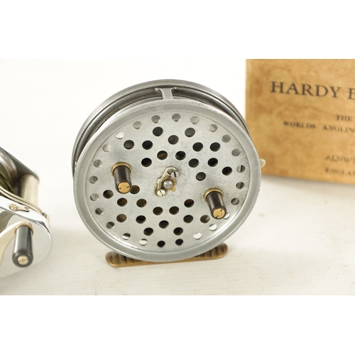 611 - THREE HARDY FISHING REEL, a 3 1/2