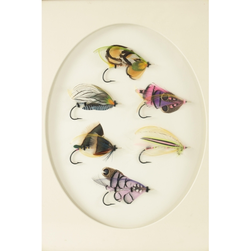 619 - THREE FRAMED WALL MOUNTED DISPLAYS OF SLAMON FISHING FLIES the pair inscribed on reverse 