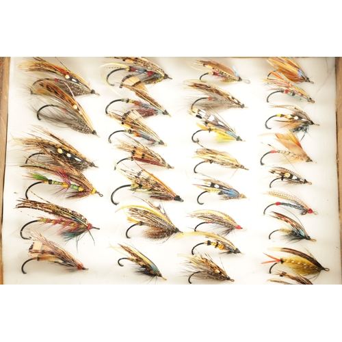 621 - FOUR CASES CONTAINING VARIOUS VINTAGE SALMON FISHING FLIES some with makers' labels.