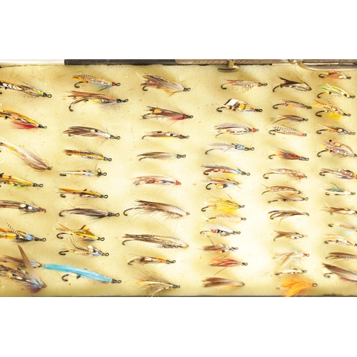 621 - FOUR CASES CONTAINING VARIOUS VINTAGE SALMON FISHING FLIES some with makers' labels.