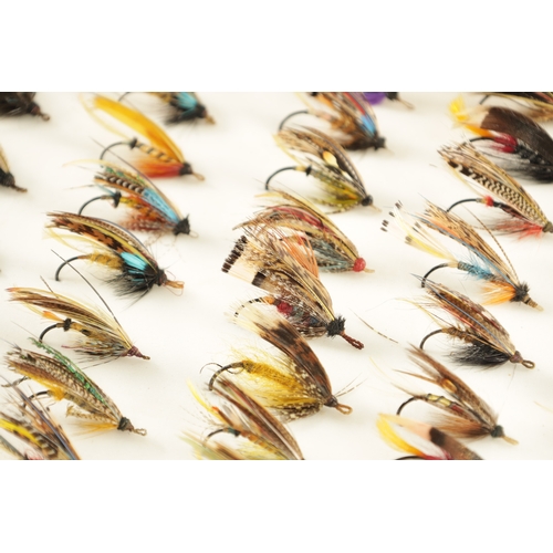 621 - FOUR CASES CONTAINING VARIOUS VINTAGE SALMON FISHING FLIES some with makers' labels.