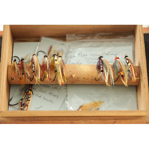 621 - FOUR CASES CONTAINING VARIOUS VINTAGE SALMON FISHING FLIES some with makers' labels.