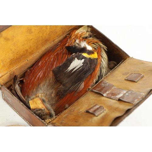 622 - A VINTAGE FISHING BASKET AND TWO LEATHER CASES CONTAINING FLY-MAKING MATERIALS (3).