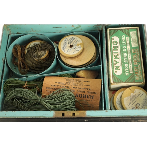 623 - A METAL BOX CONTAINING VARIOUS LURES, LINE AND ACCESSORIES (36cm wide)