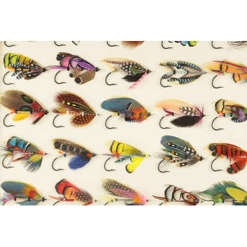 636 - THREE FRAMED WALL MOUNTED DISPLAYS OF SALMON FISHING FLIES. (3) (Largest measures 48cm high, 58.5cm ... 