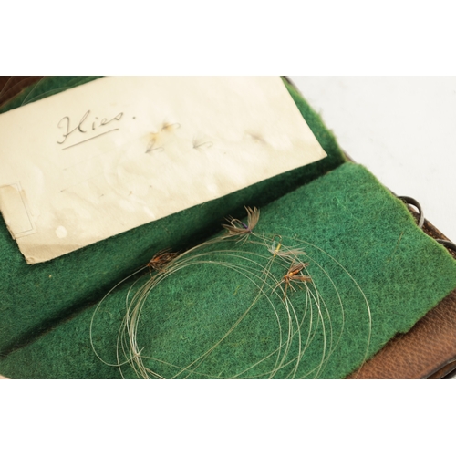 644 - THREE LEATHER FLY AND CAST WALLETS containing various flies and lines, one by Hardy Bros., another i... 