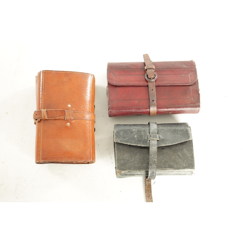 649 - THREE LEATHER FLY AND CAST WALLETS, one by W.M. Mitchell, Manchester, another with impressed makers ... 