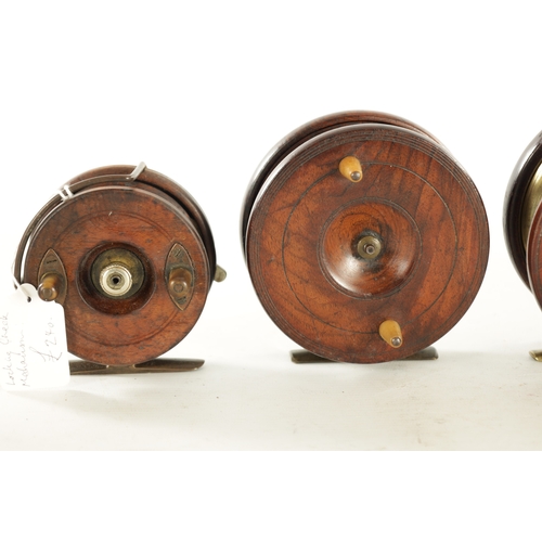 656 - A COLLECTION OF EIGHT VINTAGE WOOD AND BRASS FLY FISHING REELS, including a 3 1/4