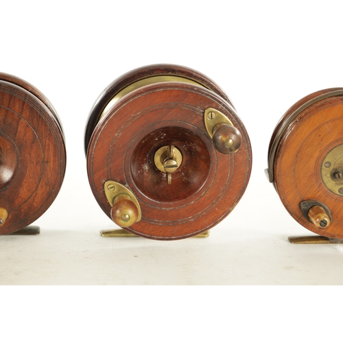 656 - A COLLECTION OF EIGHT VINTAGE WOOD AND BRASS FLY FISHING REELS, including a 3 1/4