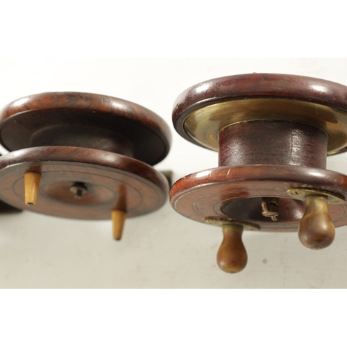 656 - A COLLECTION OF EIGHT VINTAGE WOOD AND BRASS FLY FISHING REELS, including a 3 1/4