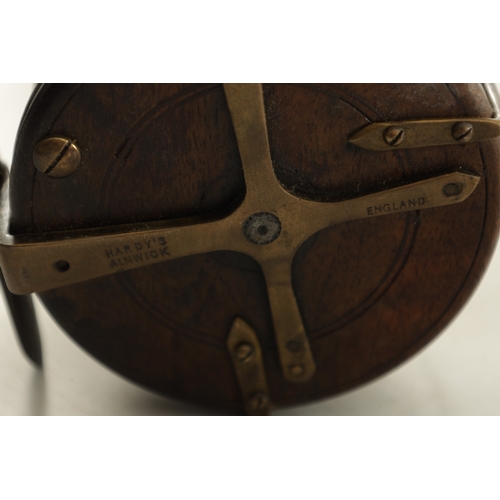 656 - A COLLECTION OF EIGHT VINTAGE WOOD AND BRASS FLY FISHING REELS, including a 3 1/4