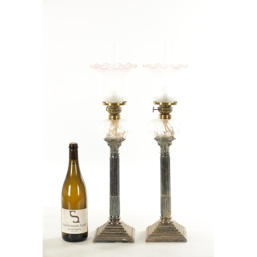 667 - A PAIR OF 19TH CENTURY SILVER PLATED CORINTHIAN COLUMN AND CUT GLASS PEG LAMPS with brass fittings a... 