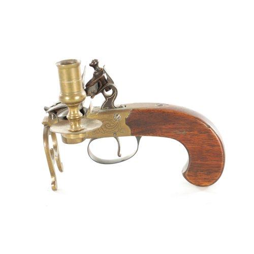 678 - A FLINTLOCK TINDER LIGHTER with side candle holder and walnut handle (13.5cm wide 10cm high )