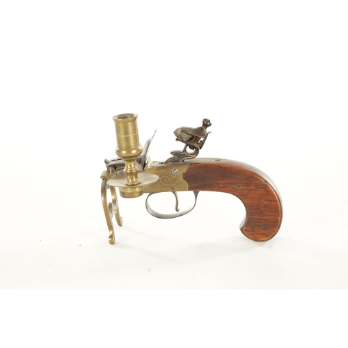 678 - A FLINTLOCK TINDER LIGHTER with side candle holder and walnut handle (13.5cm wide 10cm high )