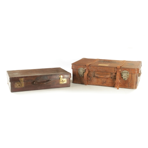 680 - TWO VINTAGE LEATHER SUITCASES (The larger measures 71cm wide)