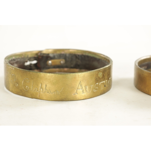 684 - TWO SIMILAR GEORGE III BRASS AND LEATHER DOG COLLARS inscribed J. R. Clapham AUSTWICK HALL (Yorkshir... 