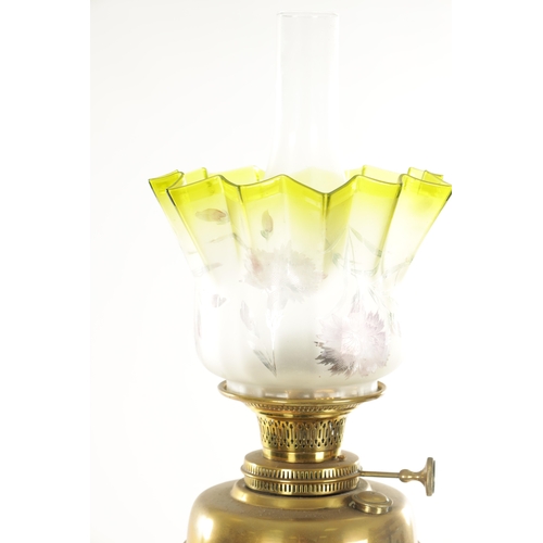 689 - A 19TH CENTURY BRASS CORINTHIAN COLUMN OIL LAMP with yellow tinted glass shade and solid brass reser... 