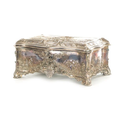 694 - A 19TH CENTURY SILVER PLATED ROCOCO STYLE CASKET decorated with cherubs, stamped Walker and Hall, Sh... 