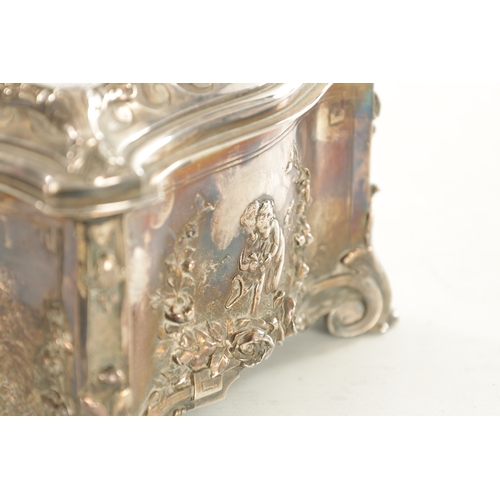 694 - A 19TH CENTURY SILVER PLATED ROCOCO STYLE CASKET decorated with cherubs, stamped Walker and Hall, Sh... 