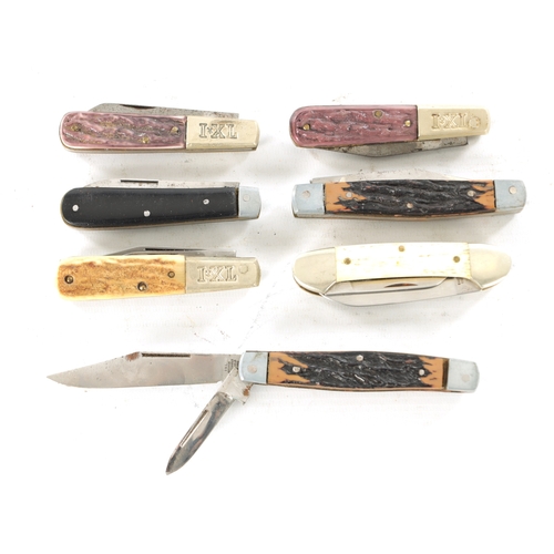 703 - A COLLECTION OF SEVEN FOLDING KNIVES BY GEORGE WOSTENHOLM, SHEFFIELD with various handles. (7)