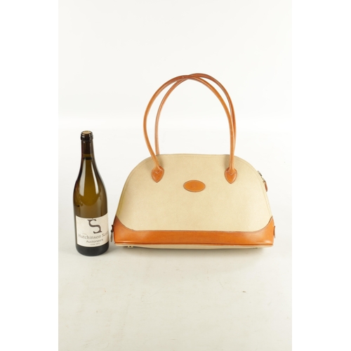 706 - A MULBERRY CREAM AND TAN LEATHER HANDBAG with dust cover