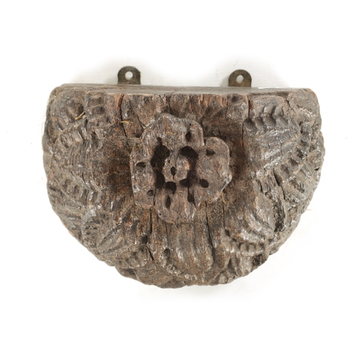 739 - AN EARLY CARVED OAK WALL BRACKET WITH TUDOR ROSE DECORATION (26cm wide 12.5cm deep )