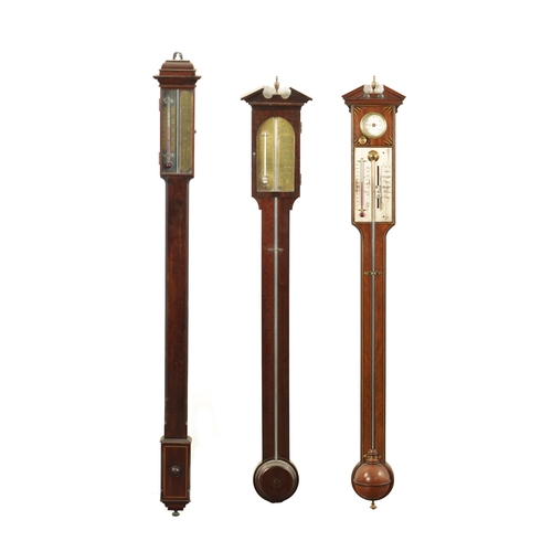 769 - A COLLECTION OF THREE 20TH CENTURY GEORGIAN STYLE STICK BAROMETERS in mahogany cases with calibrated... 