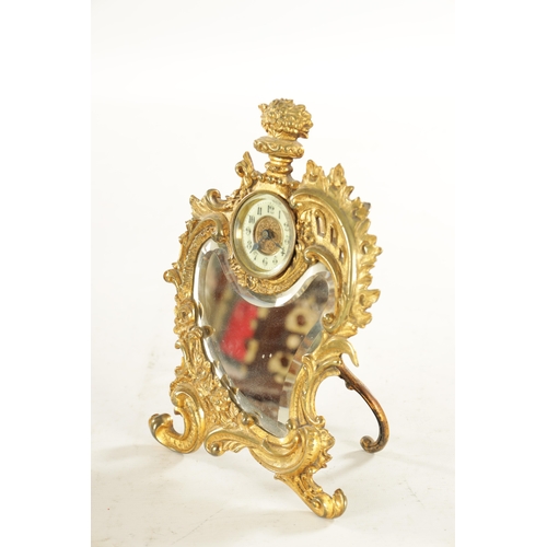 776 - A LATE 19TH CENTURY FRENCH GILT BRASS ART NOVEAU STYLE EASLE TABLE CLOCK with bevelled mirror and sp... 