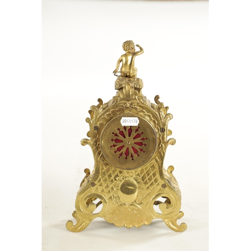 807 - A LATE 19TH CENTURY FRENCH ROCOCO PORCELAIN PANELLED BRASS MANTEL CLOCK with ornate case and eight-d... 