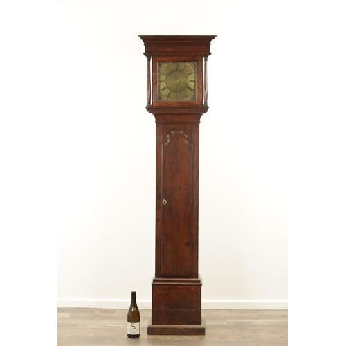 812 - A SMALL 18TH CENTURY 30-HOUR LONGCASE CLOCK the slender oak case with shaped door and turned pillars... 