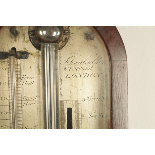 814 - SCHMALCALDER 82, STRAND LONDON. A GEORGE III FIGURED MAHOGANY STICK BAROMETER the arched case with a... 