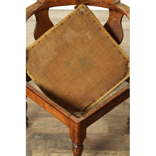 824 - A GOOD 19TH CENTURY BURR ELM CORNER CHAIR with scrolled top rail and tuned supports; above a drop-in... 