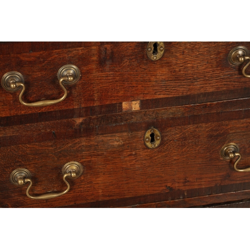 829 - A SMALL GEORGE III OAK AND WALNUT CROSS-BANDED CHEST OF DRAWERS with two small and three long gradua... 