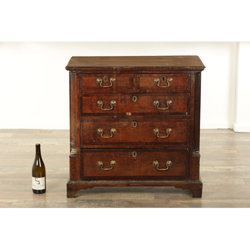 829 - A SMALL GEORGE III OAK AND WALNUT CROSS-BANDED CHEST OF DRAWERS with two small and three long gradua... 