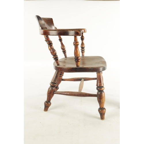 842 - A 19TH CENTURY CHILDS WALNUT ARMCHAIR with spindle supports, saddle seat and turned legs (45cm wide ... 