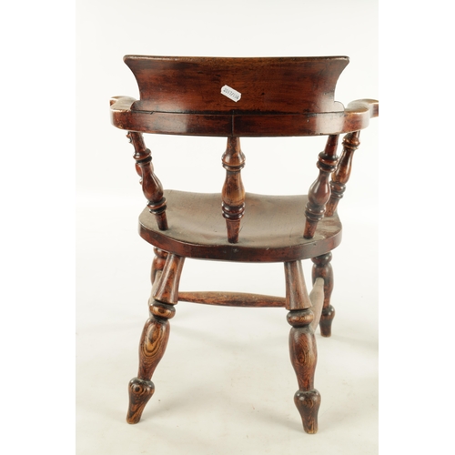 842 - A 19TH CENTURY CHILDS WALNUT ARMCHAIR with spindle supports, saddle seat and turned legs (45cm wide ... 