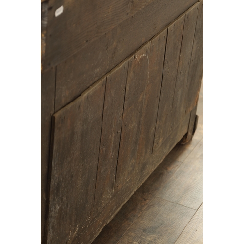 849 - AN EARLY PRIMITIVE 17TH CENTURY JOINED OAK BUREAU with shallow fall front and fitted small drawers a... 