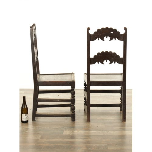 852 - A PAIR OF 17TH CENTURY YORKSHIRE SIDE CHAIRS with carved-shaped cross rails, panelled seats and ring... 