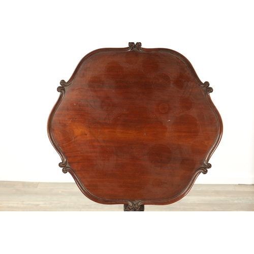 853 - A 19TH CENTURY MAHOGANY IRISH STYLE TILT-TOP TABLE with a shaped moulded edge top above, bulbous tur... 