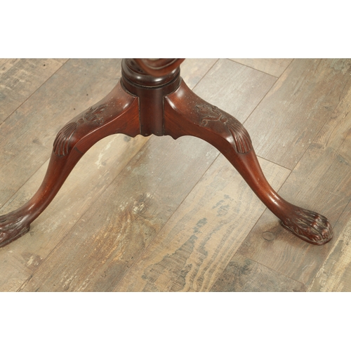 853 - A 19TH CENTURY MAHOGANY IRISH STYLE TILT-TOP TABLE with a shaped moulded edge top above, bulbous tur... 